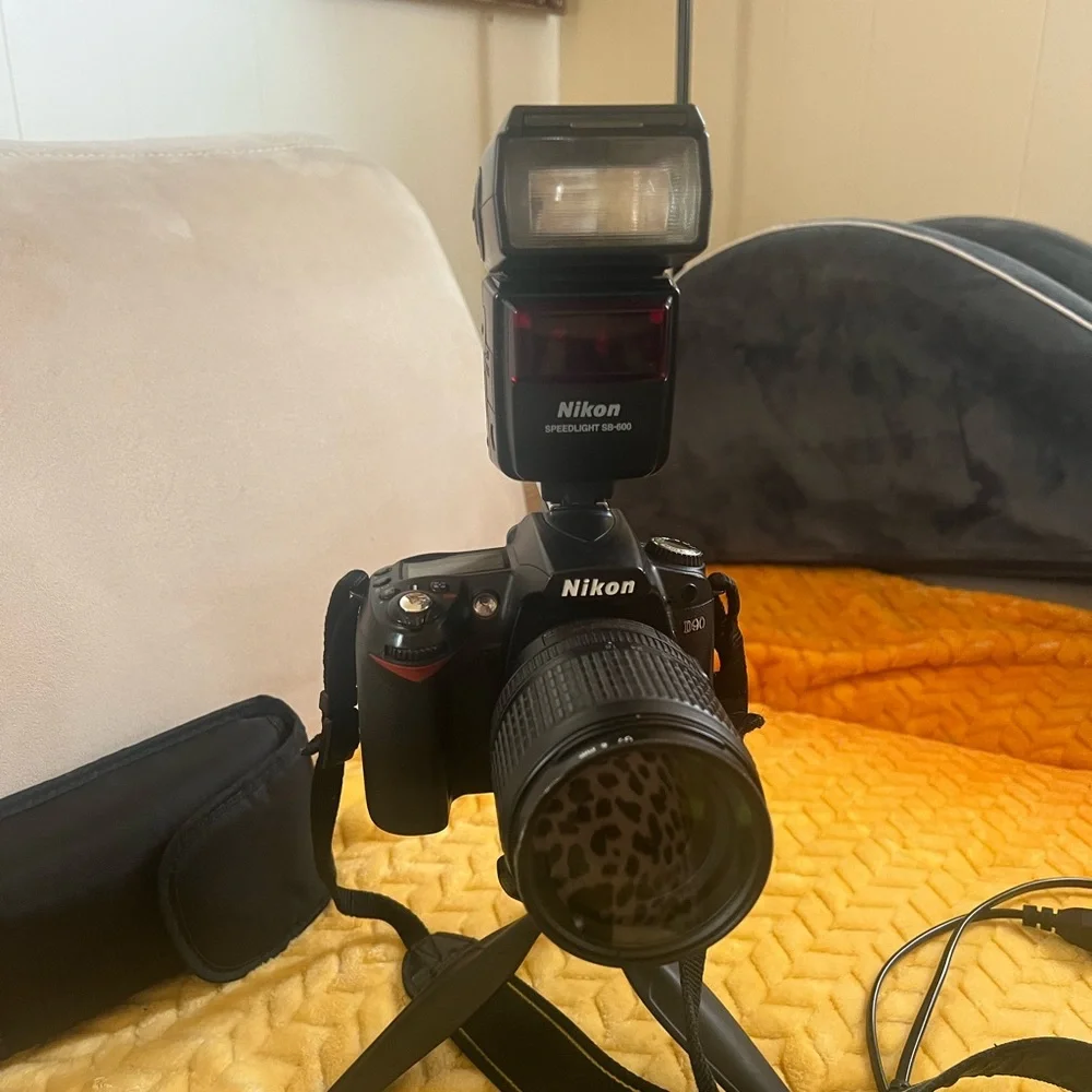 Nikon D90 with two lens and the flash